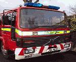 Chauffeur driven Fire Engine red limousine with real firemen for hire in North West, Cheshire, Liverpool, Manchester, Bolton, Chester, Wigan, Lancashire, Preston, Stockport and Blackburn.