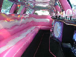 Chauffeur stretch pink Lincoln limo hire interior in Bristol, Gloucester, Cheltenham, Cardiff, Wales, Weston Super Mare, and Bath.
