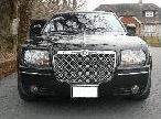 Chauffeur stretch black Chrysler C300 Baby Bentley limo hire in Nottingham, Derby, Leicester, Birmingham, Nottinghamshire, Derbyshire, Midlands.