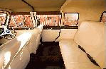 Chauffeur driven red Beauford wedding limo interior in Scotland, Glasgow, Dundee, Edinburgh, Lanarkshire, Motherwell, Paisley, East Kilbride, Kilmarnock, Coatbridge, Greenock, Hamilton and Perth.