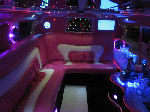 Chauffeur stretch pink Hummer H2 limousine hire interior in Newcastle, Sunderland, Durham, and North East