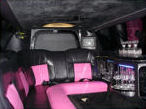 Chauffeur stretch pink limo hire interior in UK