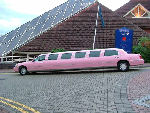 Chauffeur stretched pink Lincoln limousine hire in Bristol, Gloucester, Cheltenham, Cardiff, Wales, Weston Super Mare, and Bath.