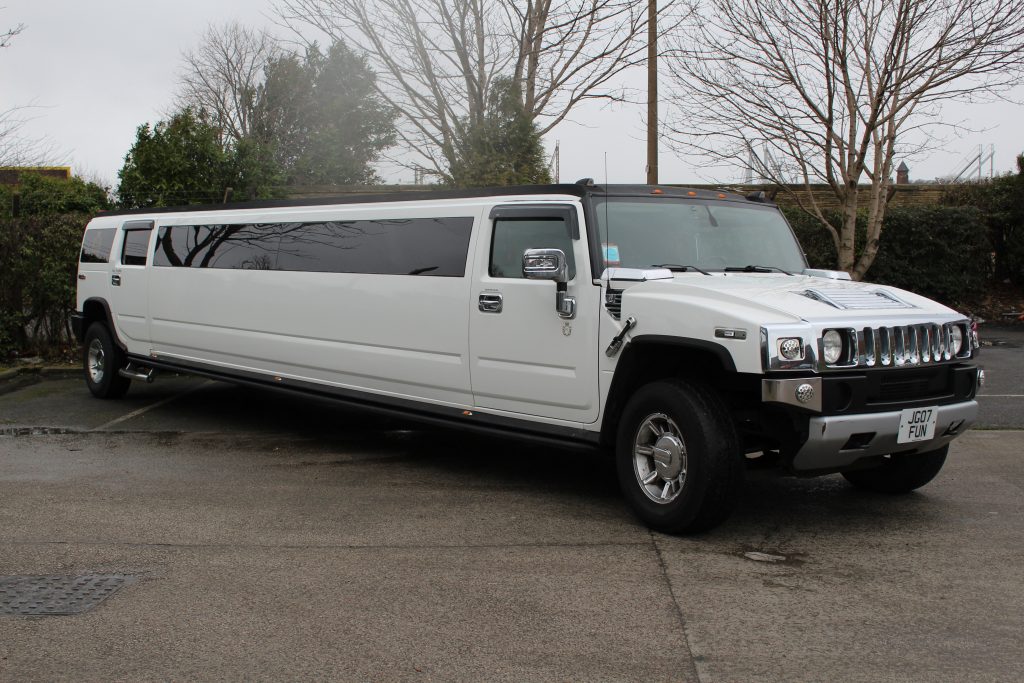 White stretch Hummer H2 limousine for a Christmas night out