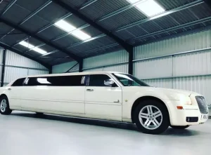 Chauffeur driven Chrysler Baby Bentley limousine hire in London.