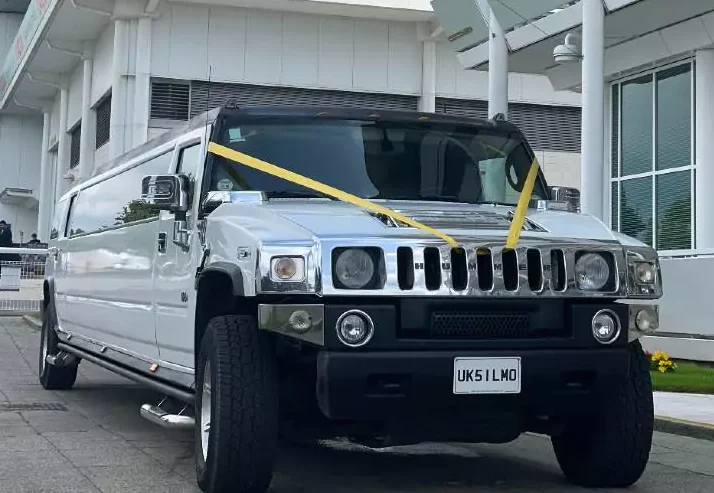 White Hummer H2 stretch limousine